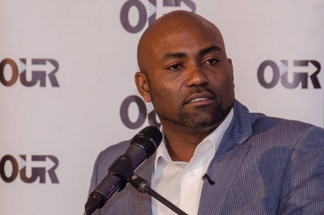 Energy, Science and Technology Minister, Dr. the Hon. Andrew Wheatley, addresses a Girls in Information and Communication and Technology (ICT) Day seminar and workshop, held at the Knutsford Court Hotel, today (April 28).  (Photo: Donald Delahaye)