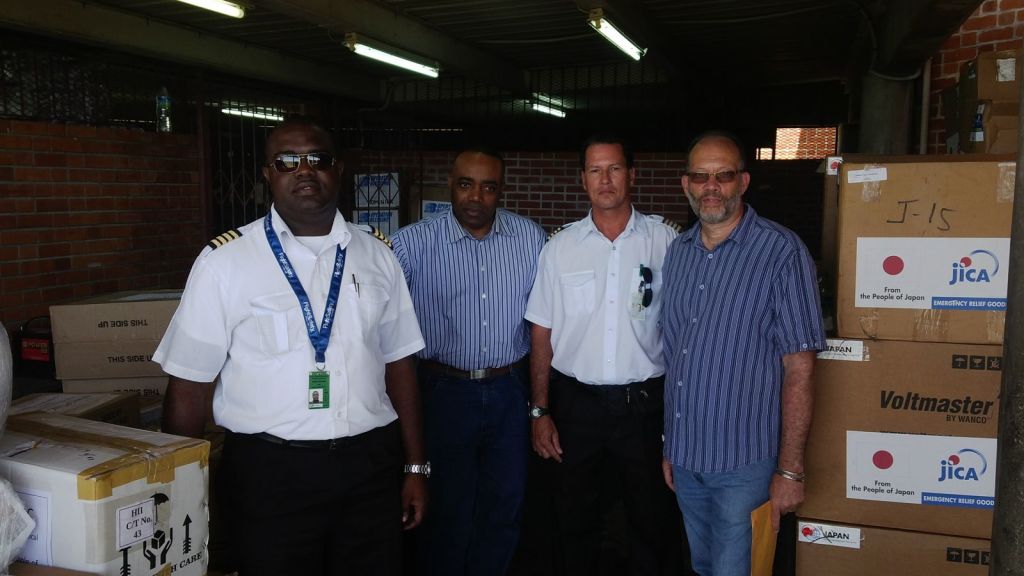At the Cane field airport, Dominica on Saturday (l-r): JAGS co-Pilot; Minister of National Security, Justice and Immigration Hon.. Rayburn Blackmoore; JAGS Pilot;; CARICOM Secretary-General Ambassador Irwin LaRocque