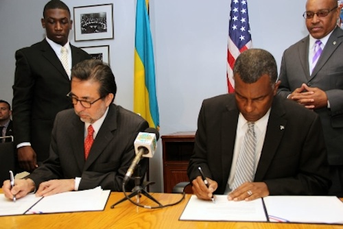 A signing ceremony in Nassau this week (BIS Photo)