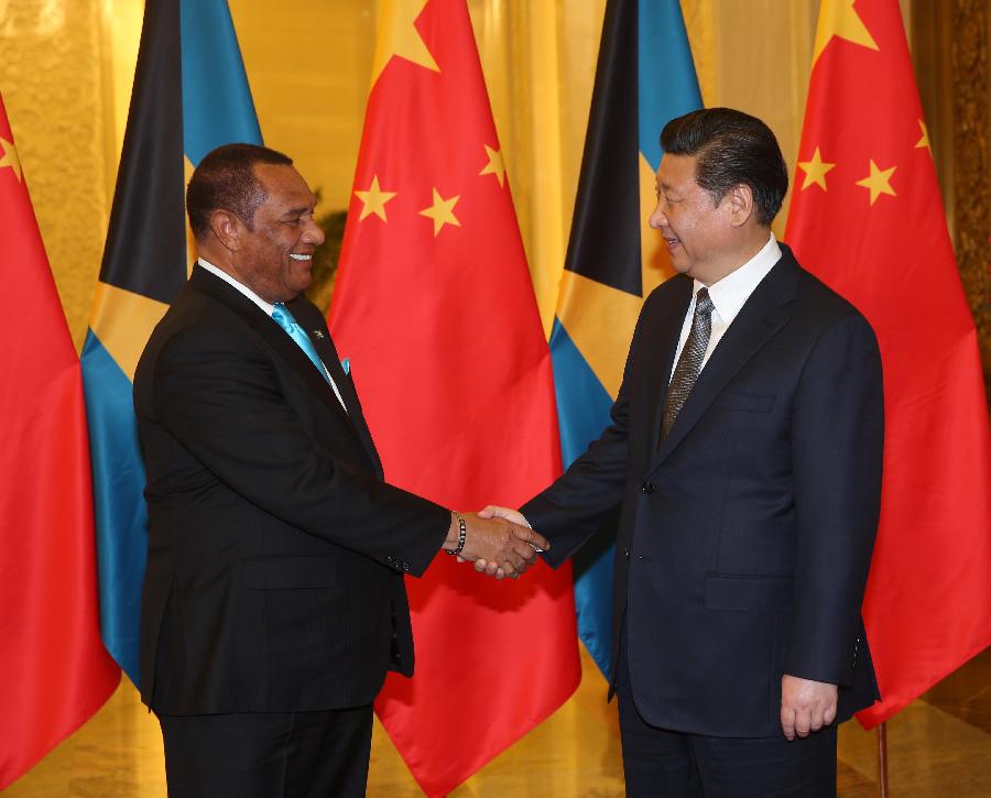 CARICOM Chairman, Prime Minister of The Bahamas Perry Christie (L) meets Chinese President Xi Jinping in Beijing, capital of China, ahead of Thursday&rsquo;s start of the first Ministerial meeting of the Forum of China and the Community of Latin Amer