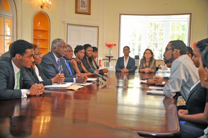 Prime Minister Freundel Stuart (left centre) engages in a discussion with 19 first to third year students of the University of the West Indies following a meeting at his official residence Ilaro Court recently. Also pictured are Barbados&rsquo; Ambas