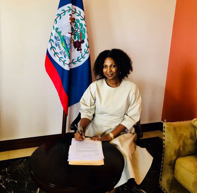 Hon. Kim Simplis-Barrow, Belize's Special Envoy for Women and Children and Chair of the Spouses of CARICOM Leaders Action Network (SCLAN) signs the document