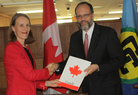 Ambassador Irwin LaRocque, CARICOM Secretary-General, accepts the Letters of Credence from Her Excellency Nicole Giles, Ambassador of Canada to CARICOM, on Wednesday, 19 February 2014 at the Georgetown, Guyana Headquarters of the CARICOM Secretariat.