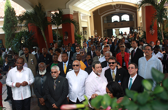 CARICOM Day, Friday 4 July 2014, was celebrated at the ongoing 35th CARICOM Heads of Government conference in Antigua/Barbuda with a flag raising ceremony. The Heads joined other participants outside the conference venue for the raising of the Antigu