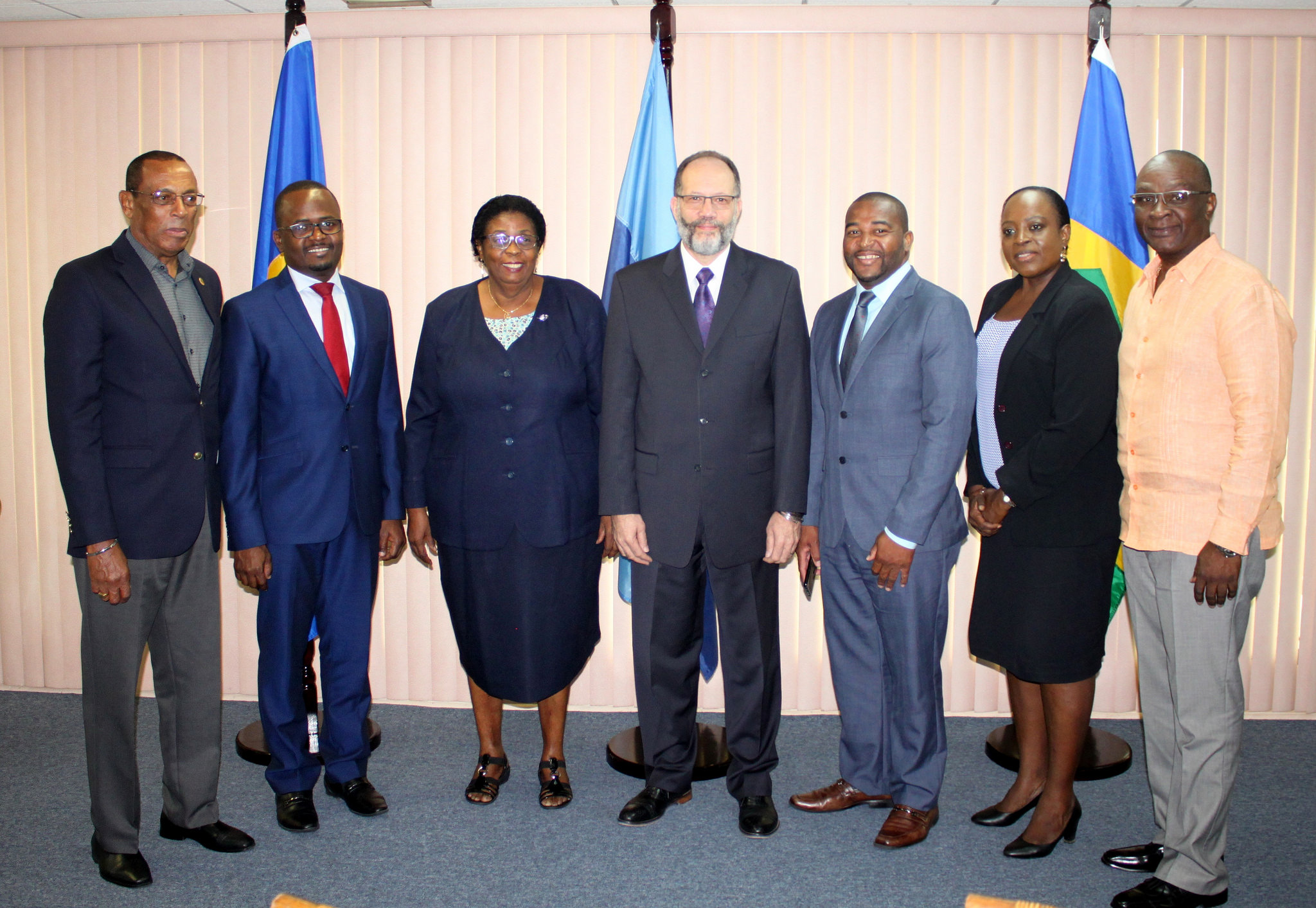 Fellow Ambassadors and the Secretary-General pose with the Ambassadors of Barbados  (3rd left) and SVG (3rd right)
