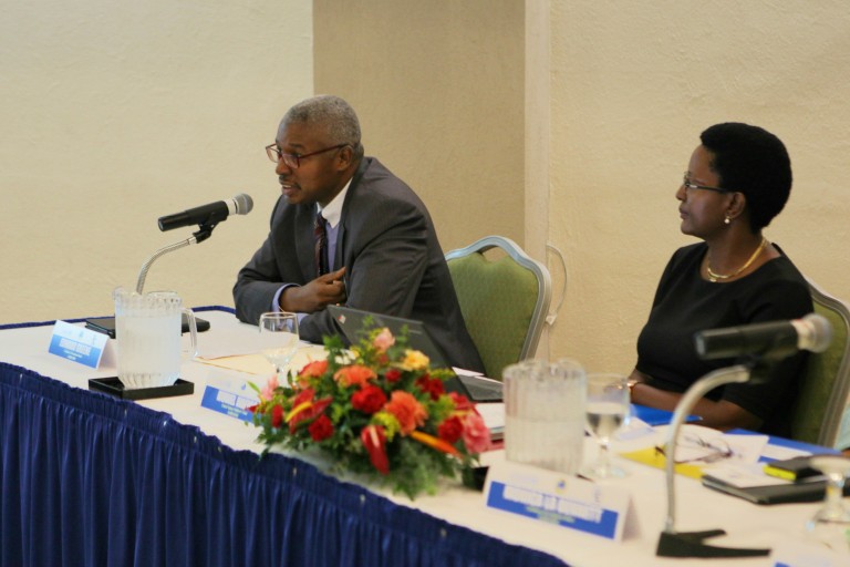 Edward Greene, Division Chief, Technical Cooperation Division, CDB (left) and Muriel Mafico, Deputy Representative, UNICEF (right), during the Midterm Review Meeting on Monday, March 14, 2016.