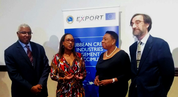 Officials chat during the stakeholder consultation on the establishment of the CCIMU in Jamaica on April 12, 2016. From left are: Edward Greene, Division Chief, Technical Cooperation Division, CDB; Pamela Coke-Hamilton, Executive Director, Caribbean