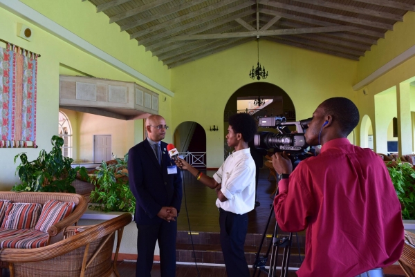 CROSQ CEO Mr Deryck Omar speaking to media after the opening of the workshop.