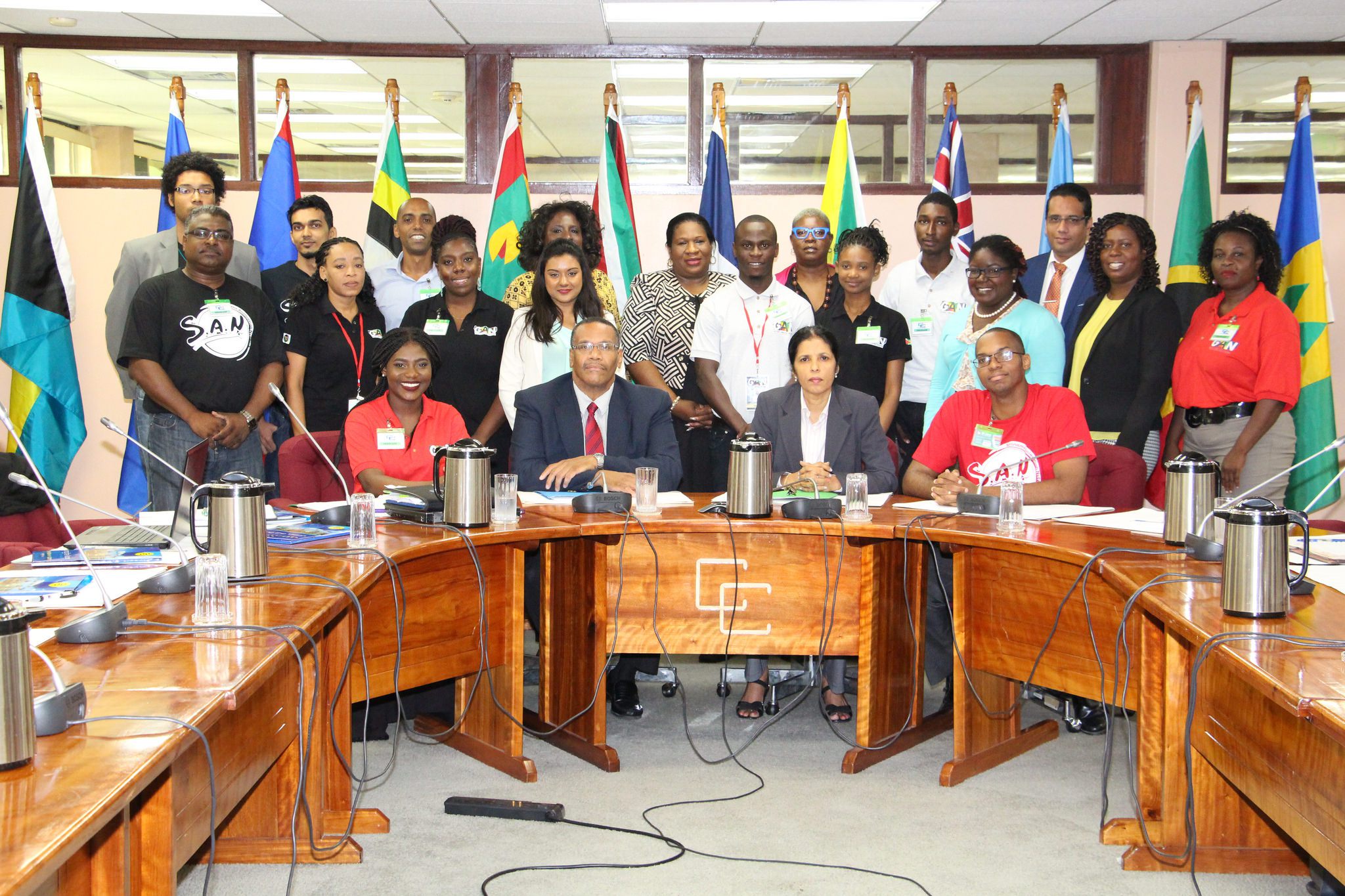Amb. Manorma Soeknandan and Mr. Joseph Cox (seated, centre) with the visitors and CARICOM Secretariat staff members.