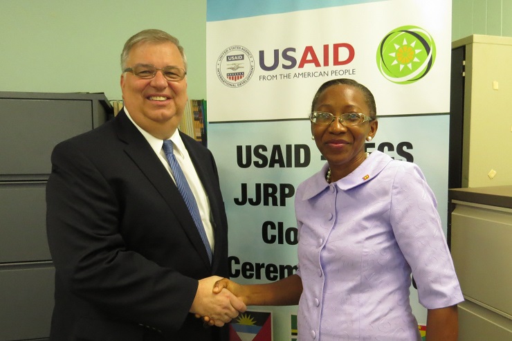 Charge D&rsquo; Affaires with the U.S Embassy in Grenada, Steve Framm (left) and Merina Jessamy , Permanent Secretary with responsibility for Agriculture, Lands and the Environment during the RRACC ceremony.