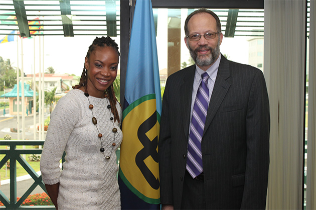 Winner of the CARICOM Song Competition Michele Henderson paid a courtesy call on CARICOM Secretary General Ambassador Irwin LaRocque on Friday 13 June 2014. Pictured here, the two pose for an official portrait at the end of her visit.