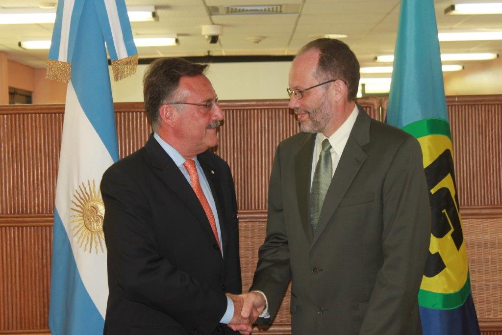 Secretary General Ambassador Irwin LaRocque, shakes hands with newly appointed Argentine Ambassador to CARICOM, H.E. Luis Alberto Martino, following an official ceremony at the CARICOM Secretariat where the Argentine Ambassador presented his letters