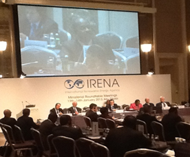 Dr. Jerrol Thompson, Advisor on Energy to Prime Minister, St. Vincent and Grenadines (shown on screen) makes a point at the 3rd IRENA General Assembly Meeting