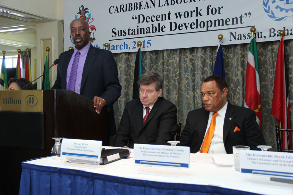 Labour Minister of The Bahamas Hon. Shane Gibson addresses the Ninth International Labour Organization Meeting of Caribbean Labour Ministers on Tuesday, March 3, 2015, Nassau, The Bahamas. Seated are Guy Ryder, Director General, International Labour