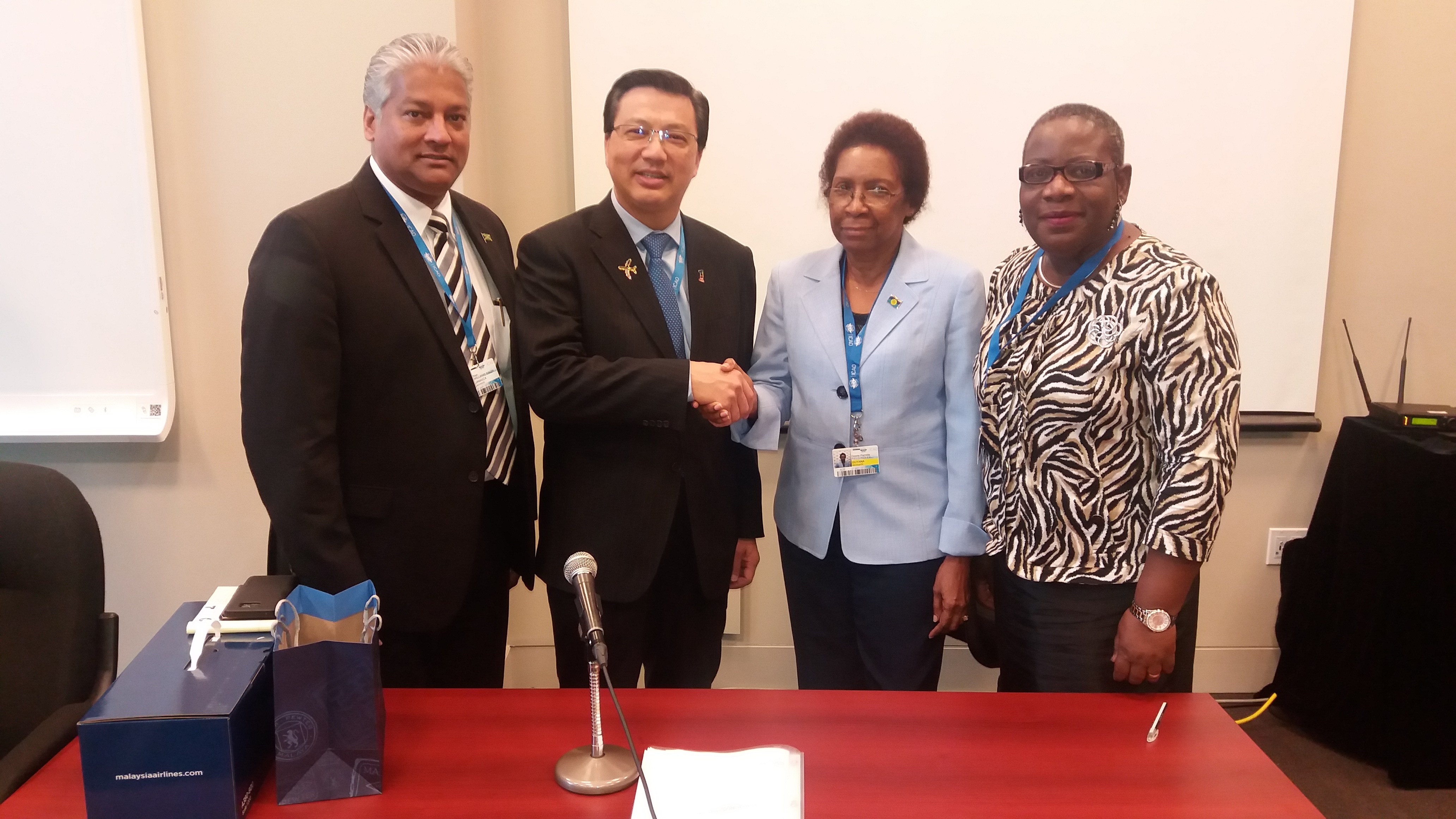 (l-r) Mr. Nari Williams-Singh, Director General, Chairman, CASSOS Board of Directors and Jamaica Civil Aviation Authority; Mr. Dato&rsquo; Sri Liow Tiong Lai, Hon. Minister of Transport, Malaysia; Ms. Desiree- Field-Ridley, CARICOM Secretariat; Dr. P