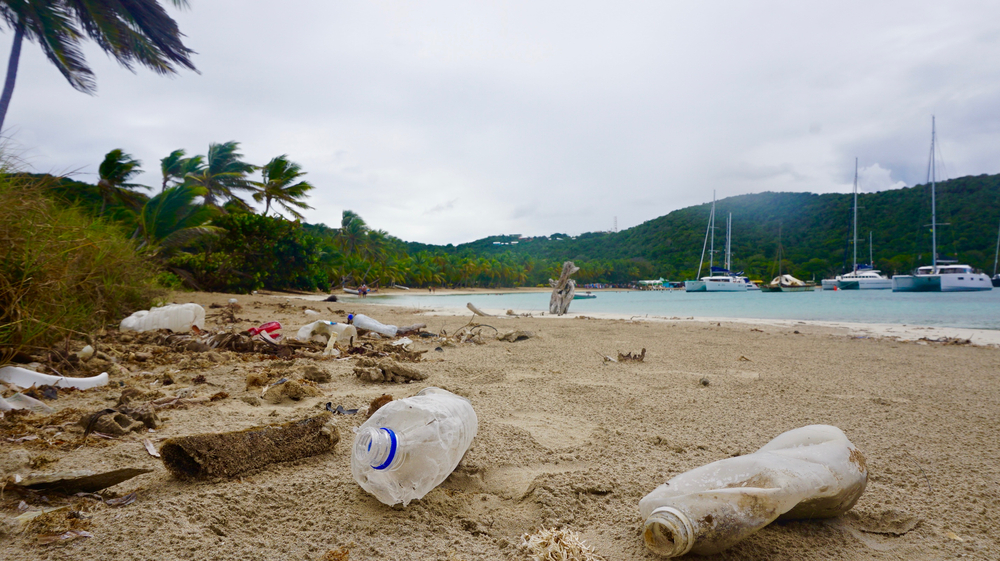 Plastic,Bottles,On,The,Beach,Of,A,Remote,Tropical,Island