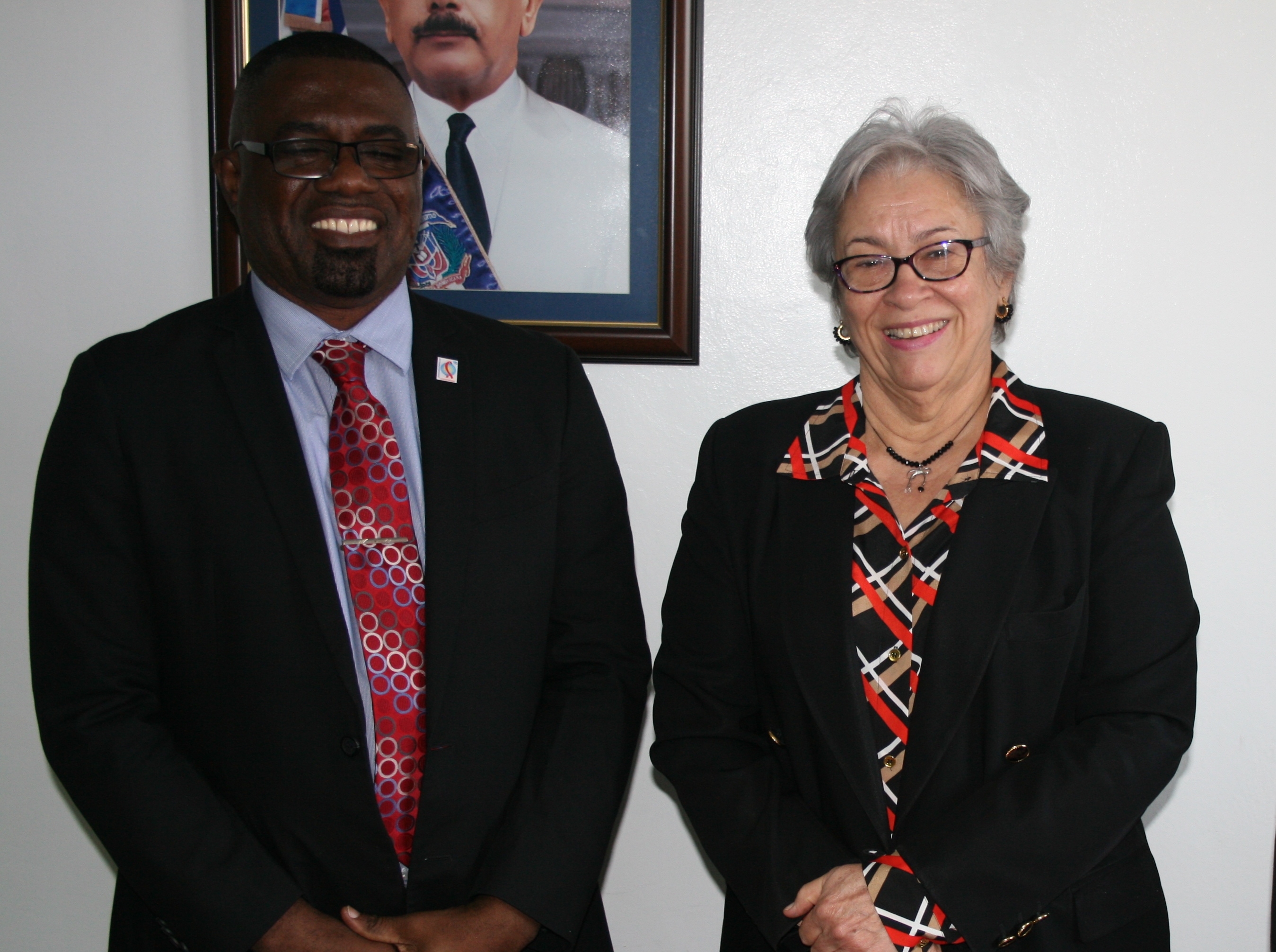 Mr Dereck Springer and Hon. Dr Altagracia Guzman Marcelino, the Minister of Health, Dominican Republic
