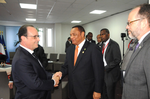 CARICOM Chairman, Prime Minister of The Bahamas Rt. Hon. Perry Christie (c) and CARICOM Secretary-General Ambassador Irwin LaRocque (r) meet French President Francois Hollande at the Caribbean-France Climate Change Summit