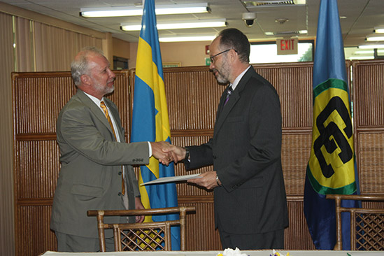 Ambassador Irwin LaRocque (R), CARICOM Secretary-General accepts the Letters of Credence of the first Plenipotentiary Representative of Sweden to the Caribbean Community, His Excellency Claes Hammar (L), on Friday 11 April 2014, at the Georgetown, Gu