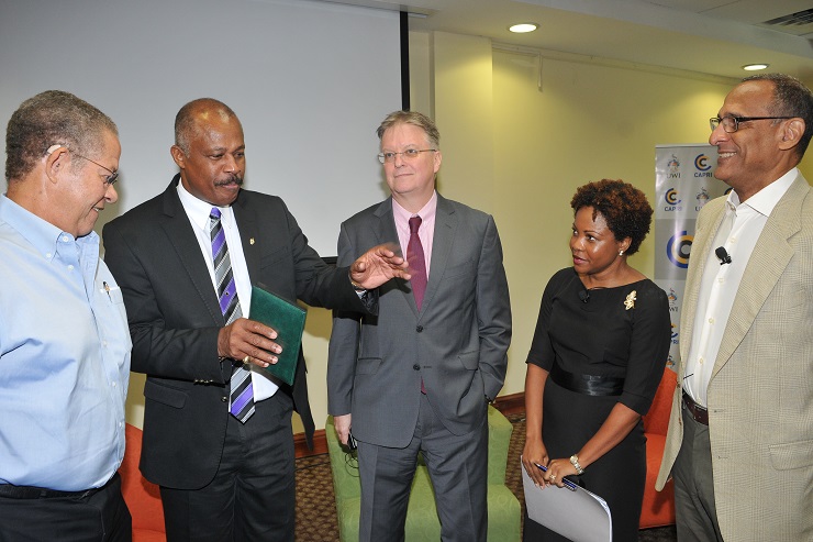 Vice Chancellor of The University of the West Indies (UWI), Sir Hilary Beckles (second right) makes a point at the UWI Forum on Brexit. With him are (l-r) Bruce Golding, Chair of Jamaica’s CARICOM Review Commission; British High Commissioner to