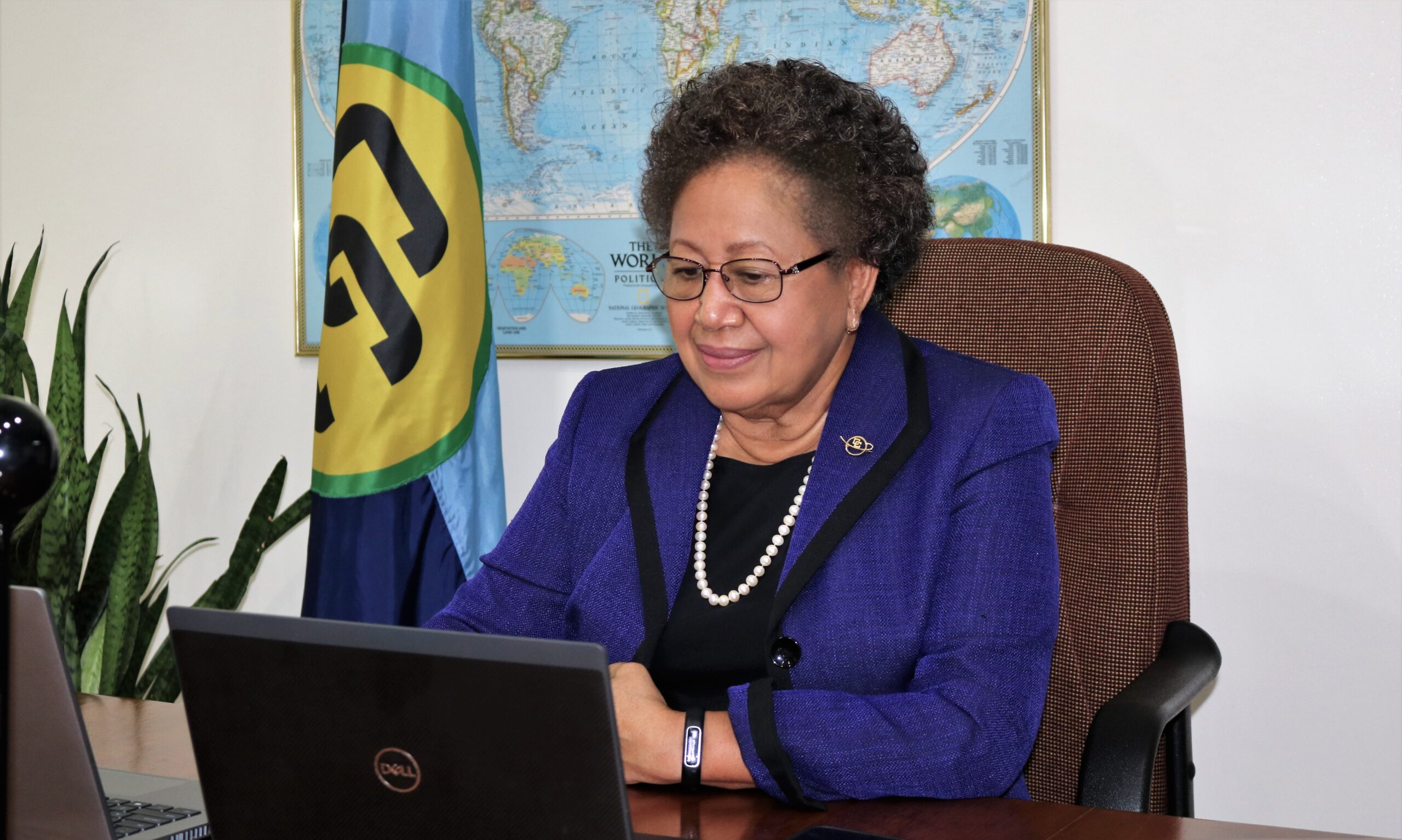 SG-at-her-desk-on-IWD-correct-1-scaled