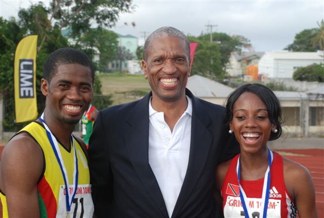 CARICOM Assistant Secretary-General Dr. Douglas Slater with 10K winners Cleveland Forde of Guyana and Tonya Nero of Trinidad and Tobago, in Antigua and Barbuda 2014