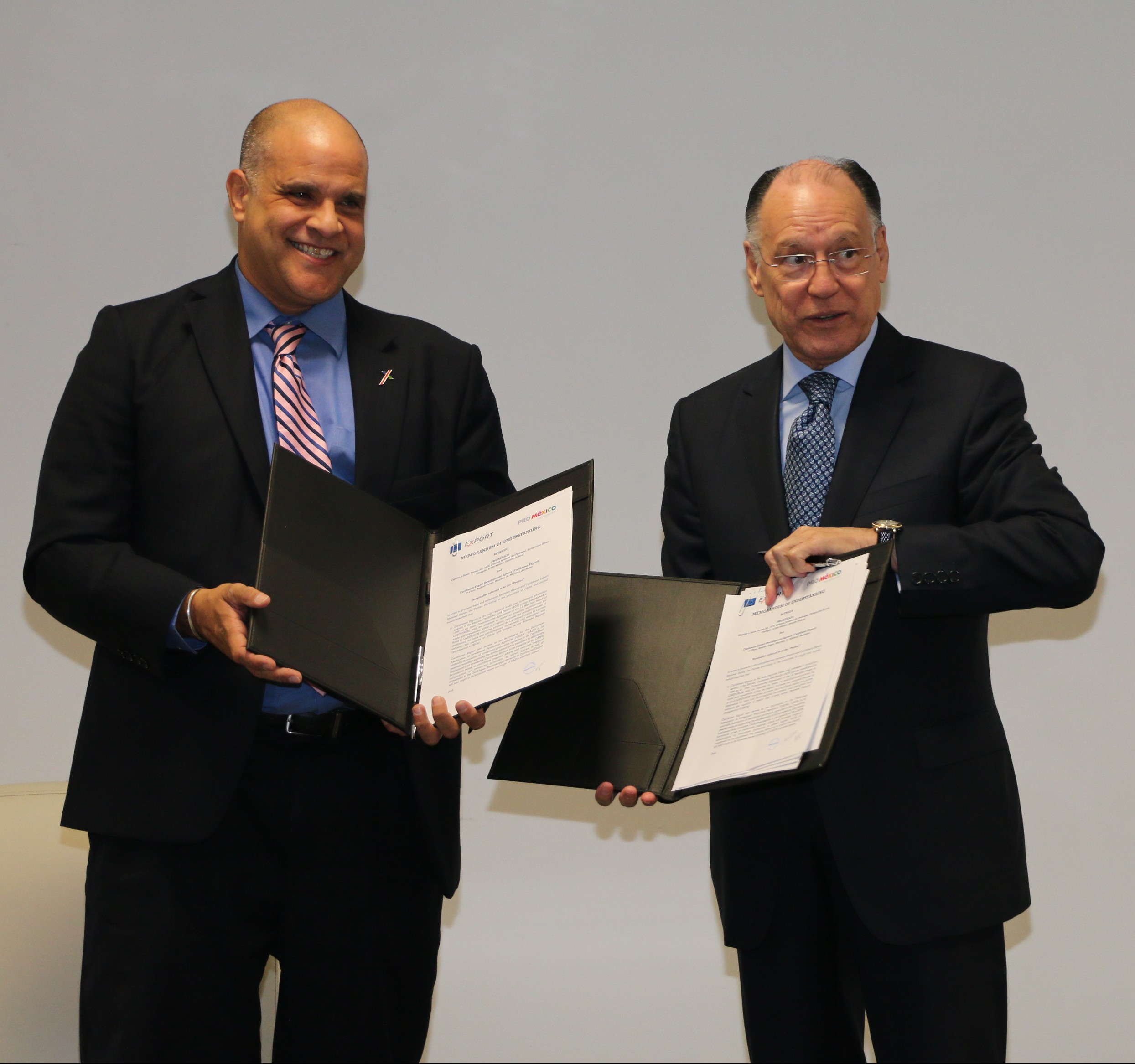 Mr. Escipion Oliveira, Deputy Executive Director, Caribbean Export (left) and Mr. Jes&uacute;s Mario Chac&oacute;n, Chief of the International Business and Investment Promotion Unit, ProMexico (right)