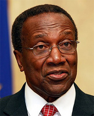 Sir Edwin W. Carrington, OCC