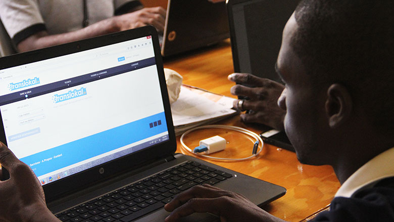 A Translokal Team member testing the website.  Berdine Edmond / World Bank.