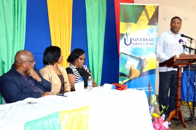 Jamaica&rsquo;s Minister of Science, Technology, Energy &amp; Mining, Hon. Phillip Paulwell (right), addresses the opening of an Internet Caf&eacute; and Information and Communication Technology (ICT) Centre at the Farm Primary and Junior High School