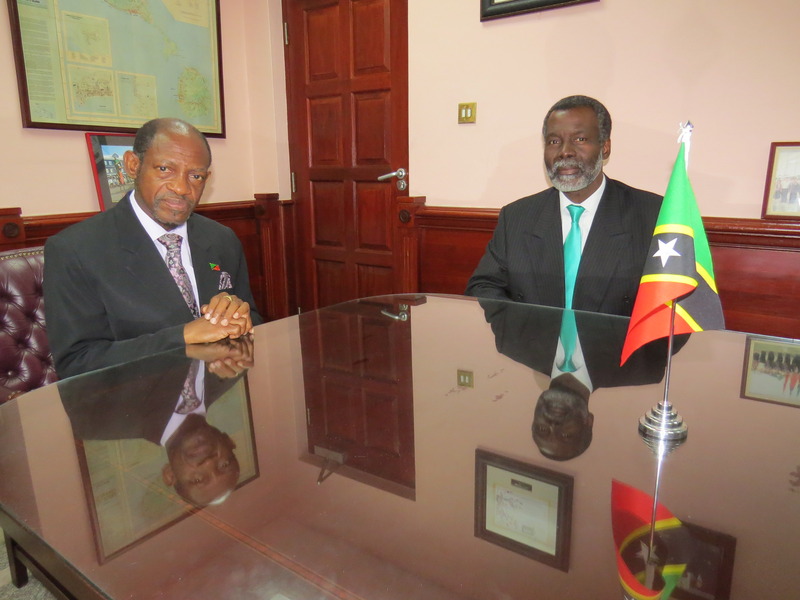 St. Kitts and Nevis&rsquo; Prime Minister the Right Hon. Dr. Denzil L. Douglas (left) and outgoing OAS Director to St. Kitts and Nevis, Mr. Starret Greene. (Photo by Erasmus Williams)