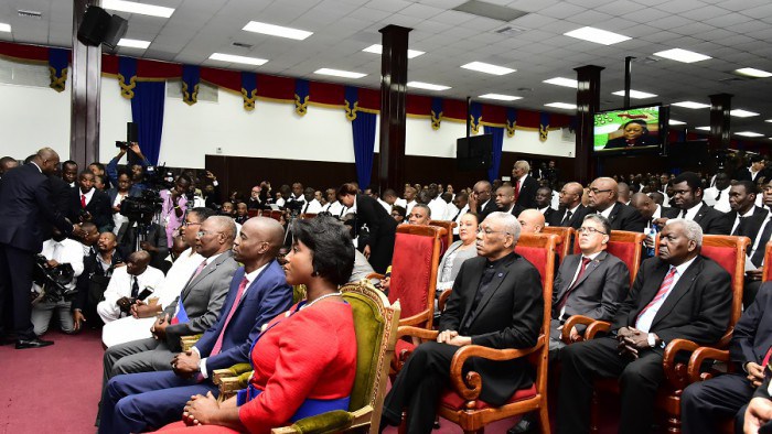 President David Granger during the Swearing in Ceremony of the new Haitian President, His Excellency Jovenel Moise. President Moise sits beside his wife Martine in the front row during the Ceremony. (Photo via Ministry of the Presidency)