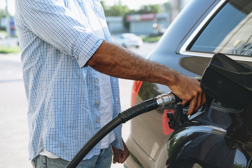 Man,Filling,Gasoline,Fuel,In,Car,At,Gas,Station