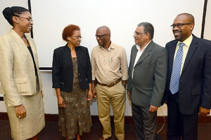 GROUP EXCHANGE: Reita Toussaint, deputy permanent secretary in the Ministry of Foreign Affairs, from left, Desiree Field-Ridley, officer-in-charge Directorate, Trade and Economic Integration, Caricom Secretariat; Canute James, senior lecturer, Caribb