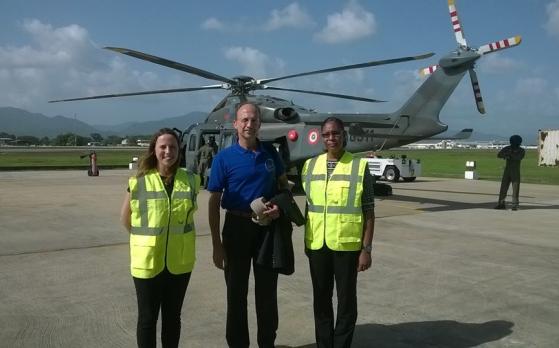 Dr. C James Hospedales, Executive Director of CARPHA accompanied by two Officers from the Agency